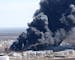 042718.N.DNT.REFINERYFIREc13 -- Thick smoke pours from the fire at the Husky Enery oil refinery in Superior, Wis. Thursday afternoon. Bob King / rking