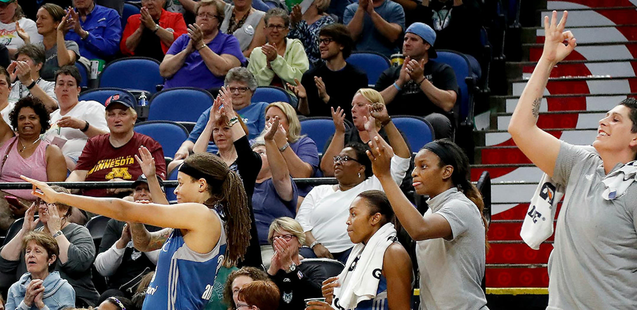 Players on the Lynx bench celebrated after a 3 pointer by Maya Moore in the fourth quarter.