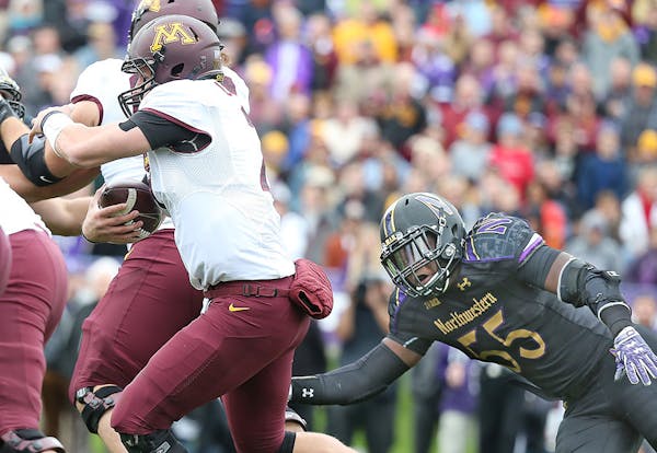 Minnesota's quarterback Mitch Leidner carried the ball against the Northwestern Wildcats at Ryan Field, Saturday, October 3, 2015 in Evanston, IL.