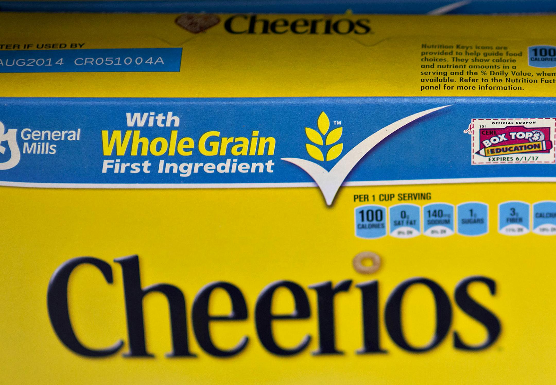 General Mills Inc. Cheerios brand cereal sits on display at a supermarket in Princeton, Illinois, U.S., on Tuesday, Sept. 17, 2013. General Mills, Inc., said net sales rose 8 percent to $4.37 billion. Photographer: Daniel Acker/Bloomberg ORG XMIT: 181327218