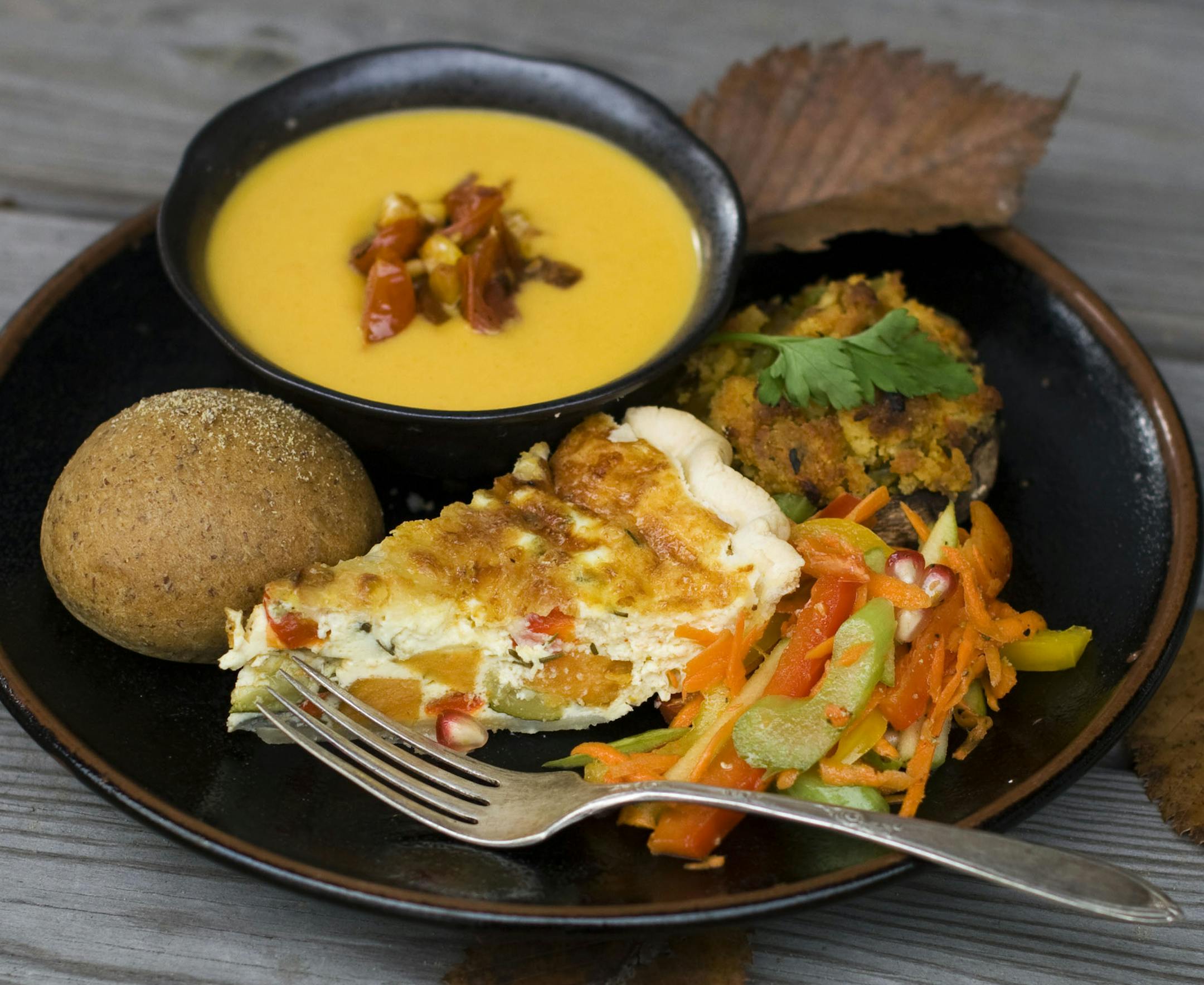 FILE - This Oct. 15, 2012, file photo, shows a vegetarian Thanksgiving dinner, in Concord, N.H. In homes across the country on Thanksgiving Day, tables will be set to accommodate everyone from vegans and vegetarians to those trying to eat like a caveman. Increasingly complicated Thanksgiving feasts reflect the growing ranks of Americans who are paying closer attention to the food they put in their bodies. (AP Photo/Matthew Mead, File)