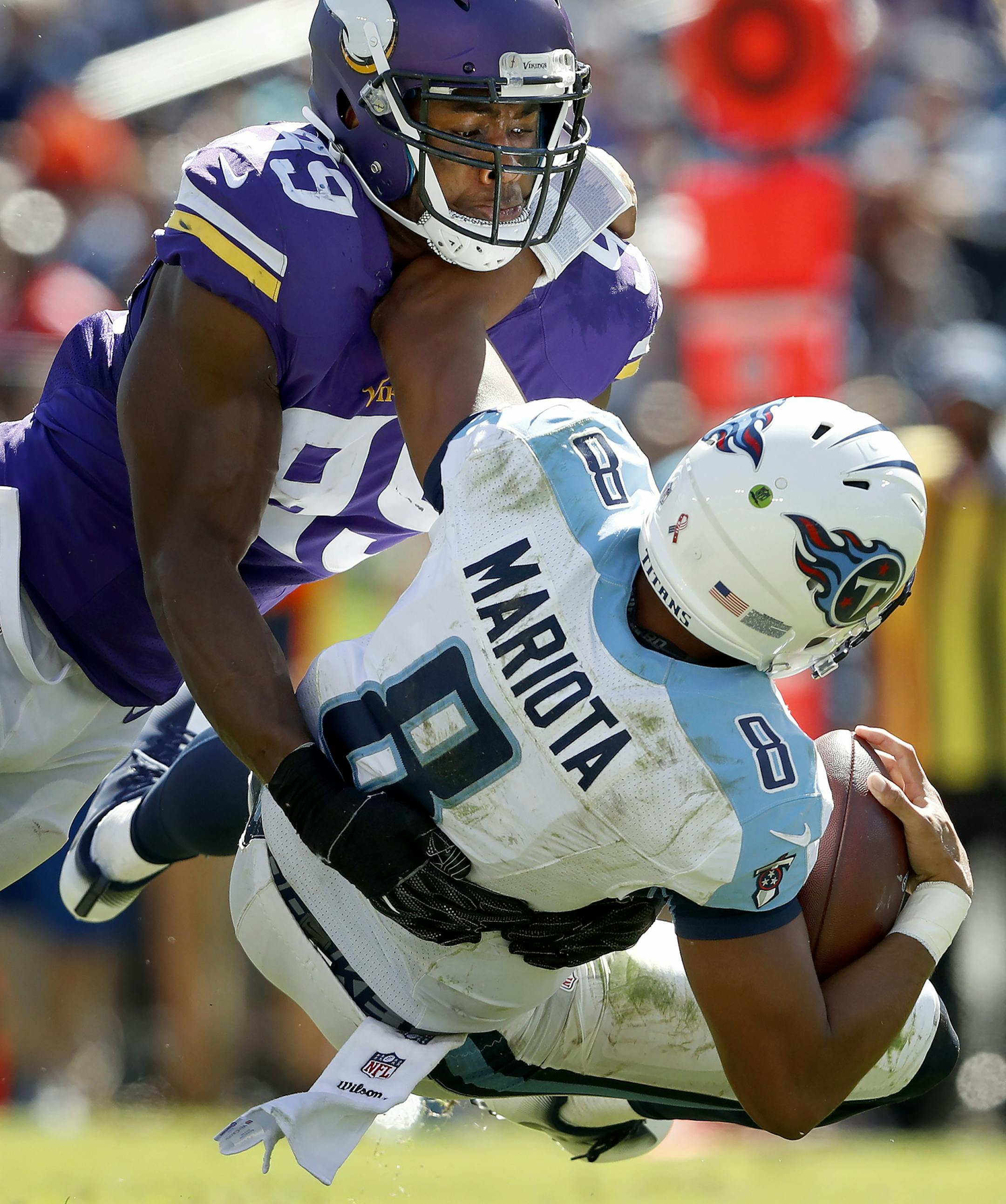 Danielle Hunter (99) sacked Marcus Mariota in the fourth quarter. ] CARLOS GONZALEZ cgonzalez@startribune.com - September 11, 2016, Nashville, TN, Nissan Stadium, NFL, Minnesota Vikings vs. Tennessee Titans