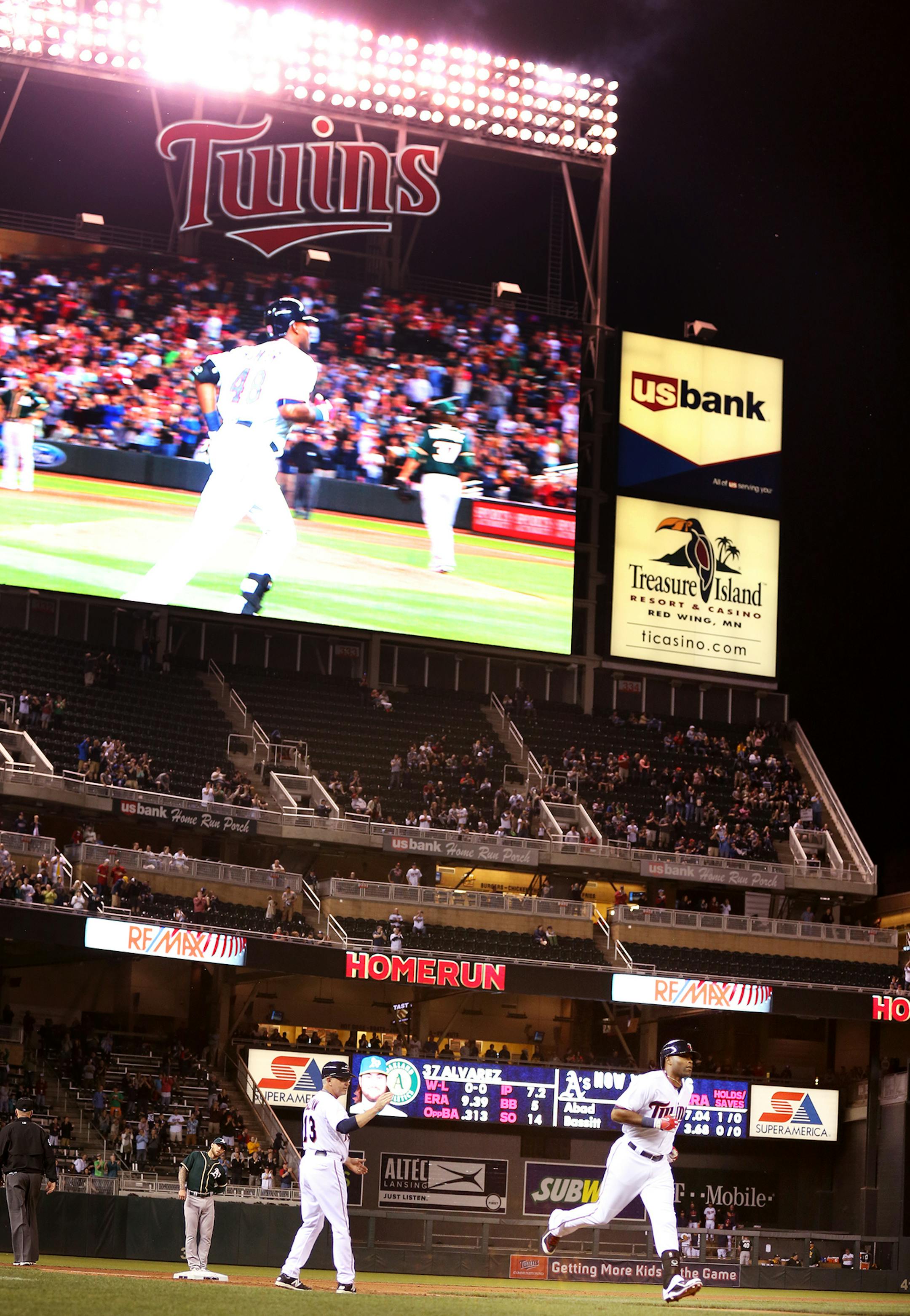 Torii Hunter of the Twins runs into home after a three-run home run against the Oakland Athletics at Target Field in Minneapolis on Monday, May 4, 2015. ] LEILA NAVIDI leila.navidi@startribune.com /