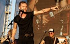 ONE TIME PRINT / WEB USE " Tallest Man on Earth " (Swedish singer/songwriter Kristian Matsson( from AXS) where he&#xed;s pointing to the right also sh