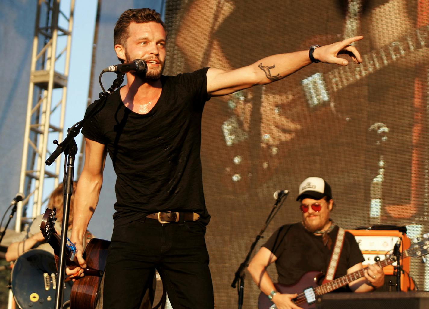 ONE TIME PRINT / WEB USE " Tallest Man on Earth " (Swedish singer/songwriter Kristian Matsson( from AXS) where he&#xed;s pointing to the right also shows his bassist Mike Lewis, a Minneapolis guy of Happy Apple/Alpha Consumer/Bon Iver notoriety. ] credit Laurie Fanelli