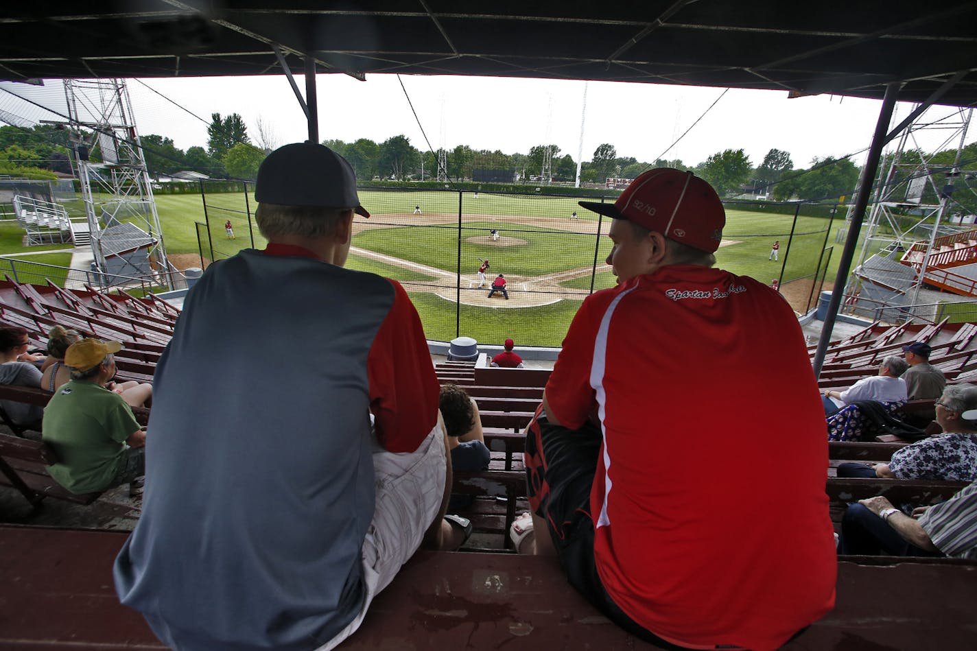 Kids watch a game from the top row of the grandstands. ] A look at the Cold Spring Springers amateur baseball town team of Cold Spring. The teams have a tradition of family members playing and managing for many years with their children helping out as bat boys and grounds keepers. (MARLIN LEVISON/STARTRIBUNE(mlevison@startribune.com)