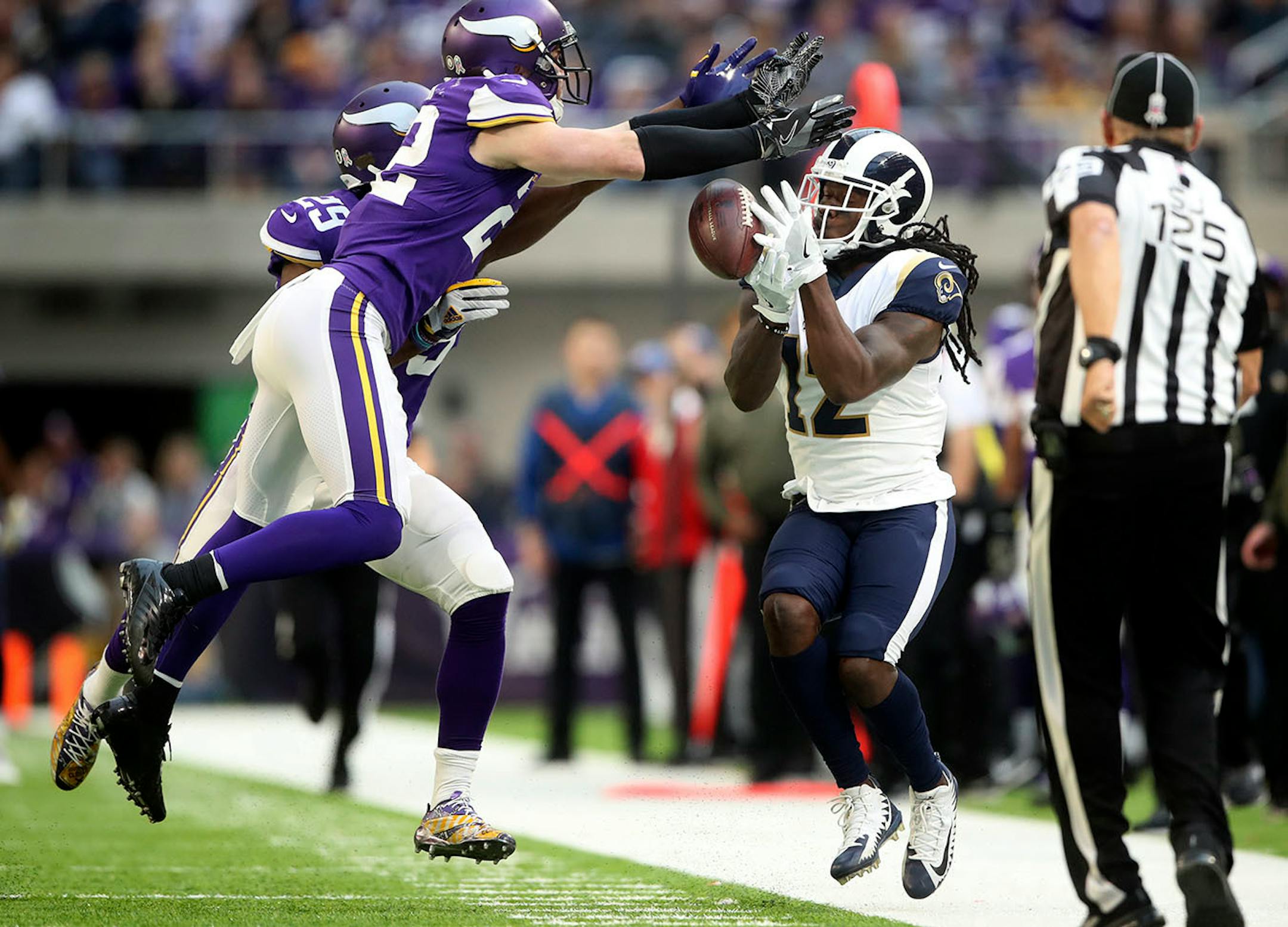 Minnesota Vikings free safety Harrison Smith (22) broke up a pass intended for Los Angeles Rams wide receiver Sammy Watkins (12) in the third quarter at U.S. Bank Stadium Sunday November 19, 2017 in Minneapolis, MN.