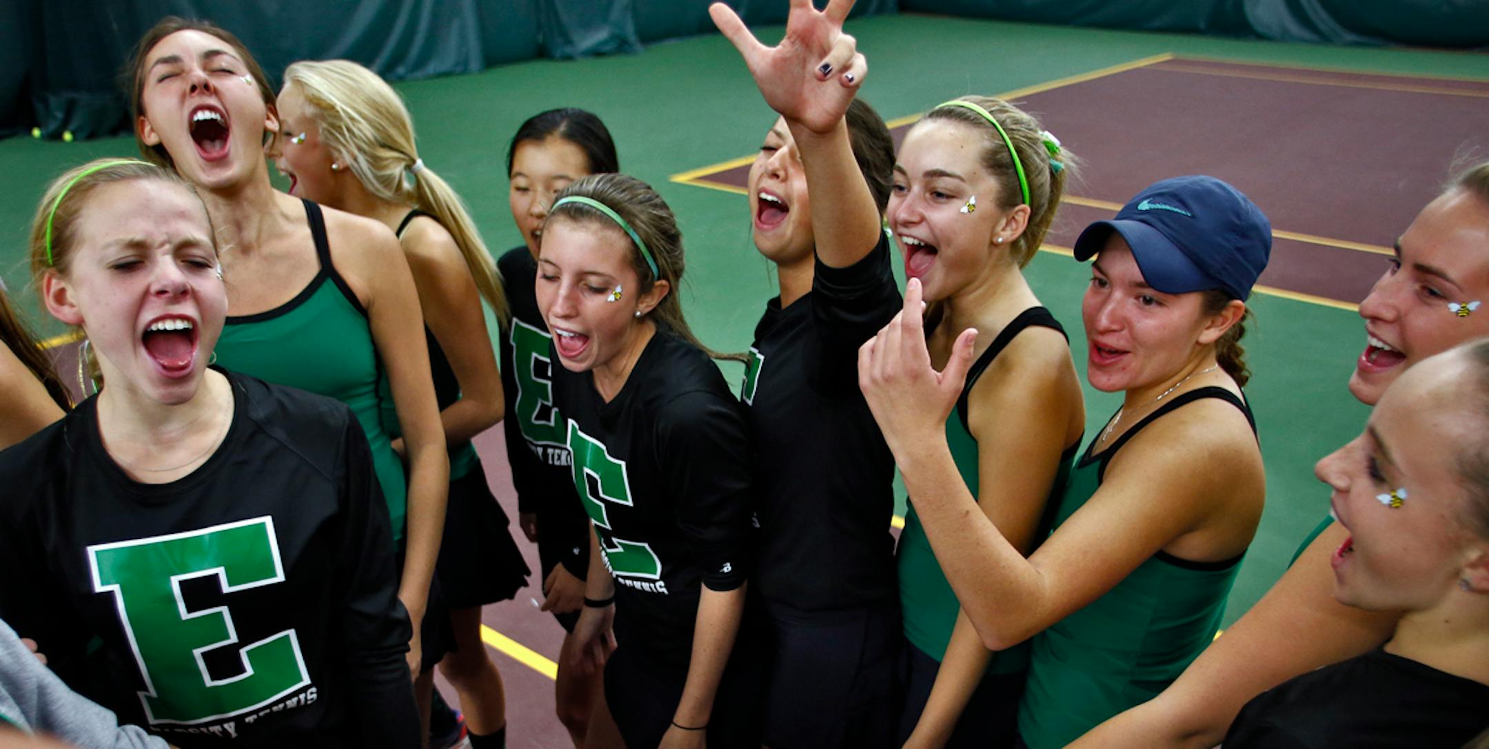 Girls Class 2A state tennis tournament finals. Edina players celebrated their team championship at the end of the tournament. . (MARLIN LEVISON/STARTRIBUNE(mlevison@startribune.com)