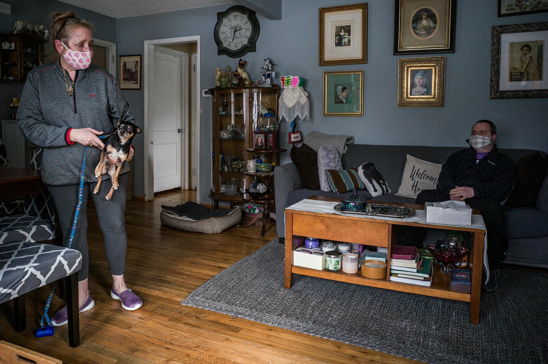 Heidi Randolph and her son, Sam Corbett, sit at home after they returned from an 8-hour trip to North Dakota so Corbett could get the COVID-19 vaccine.