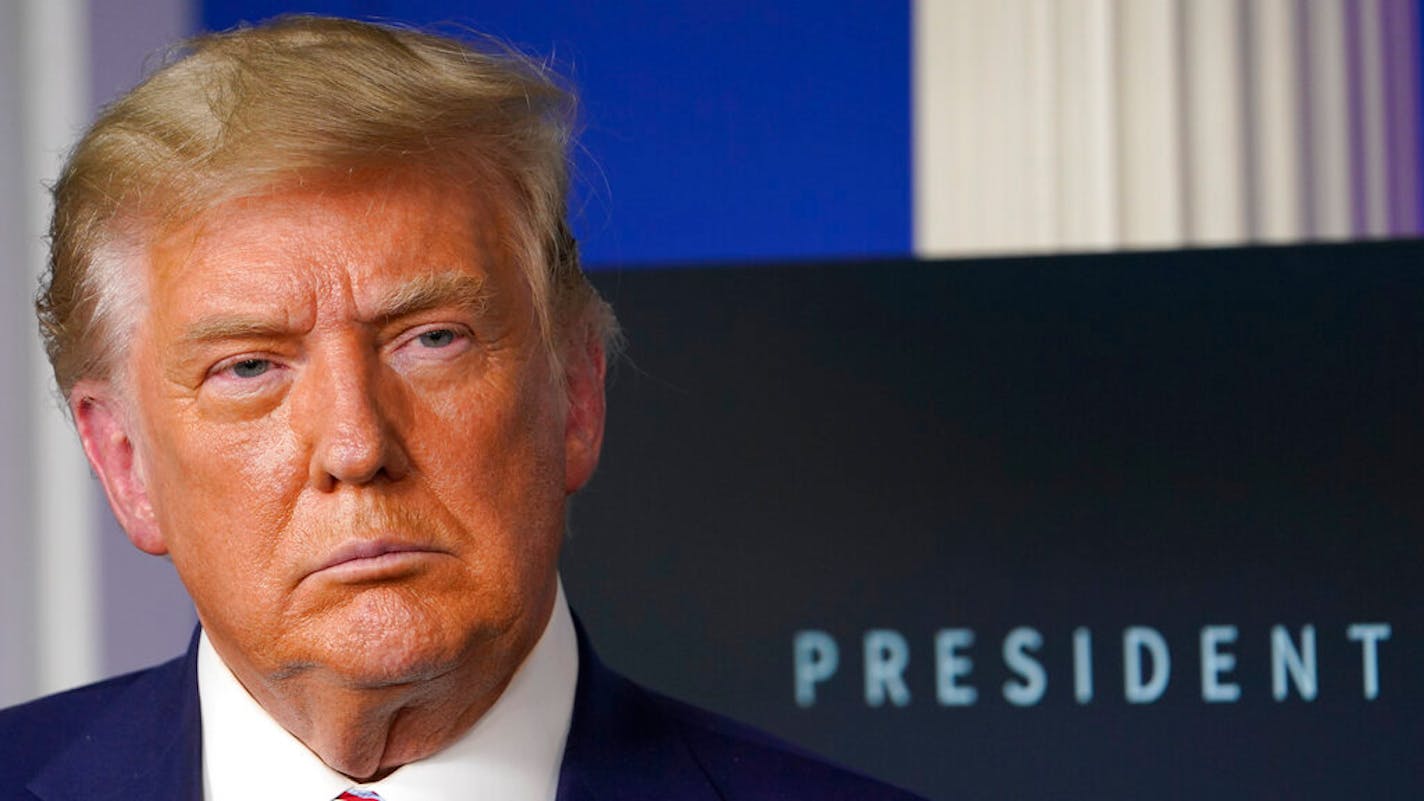 President Donald Trump listens during an event in the briefing room of the White House in Washington, Friday, Nov. 20, 2020, on prescription drug prices. (AP Photo/Susan Walsh)