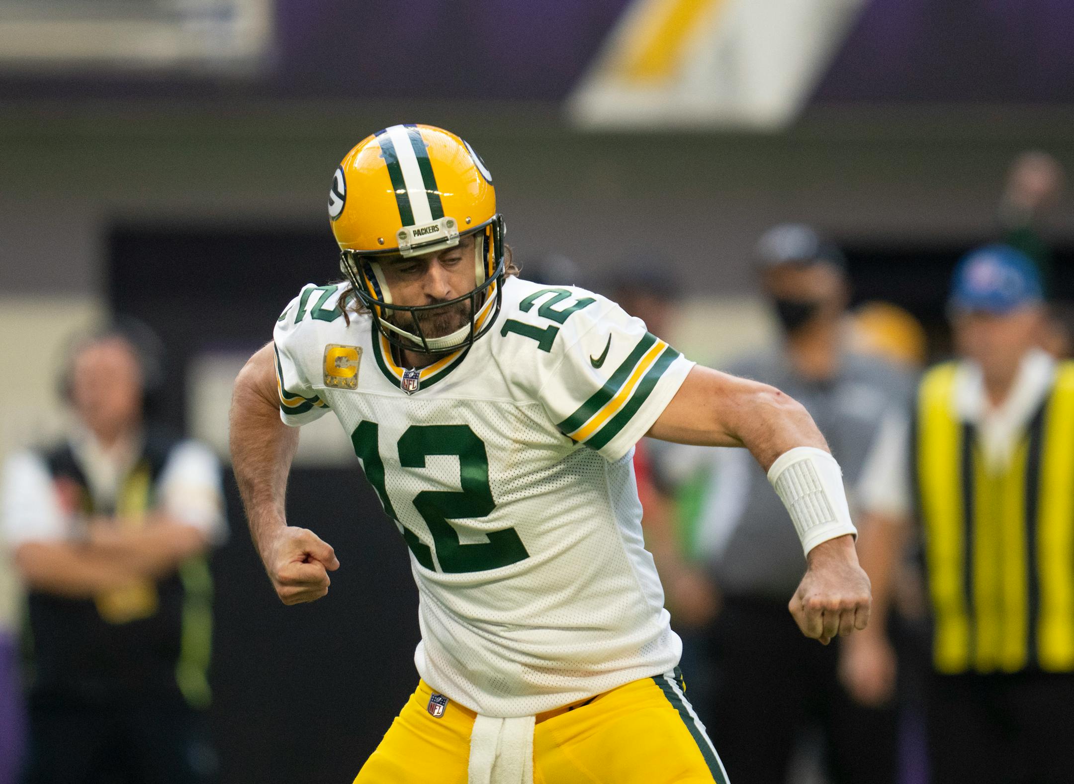 Green Bay Packers quarterback Aaron Rodgers (12) celebrated his 10 yard touchdown pass to Green Bay Packers wide receiver Davante Adams (17) in the third quarter.