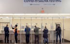 People used the COVID-19 testing site at Minneapolis-St. Paul International Airport on Nov. 20. It is free to Minnesota residents and out-of-state res