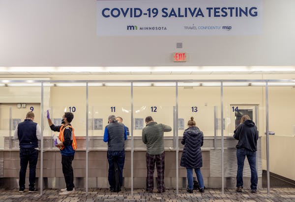 People used the COVID-19 testing site at Minneapolis-St. Paul International Airport on Nov. 20. It is free to Minnesota residents and out-of-state res