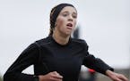 15-year old Tierney Wolfgram of Woodbury, running her first marathon, finished the Twin Cities Marathon in a time of 2:40:03, good for sixth place amo