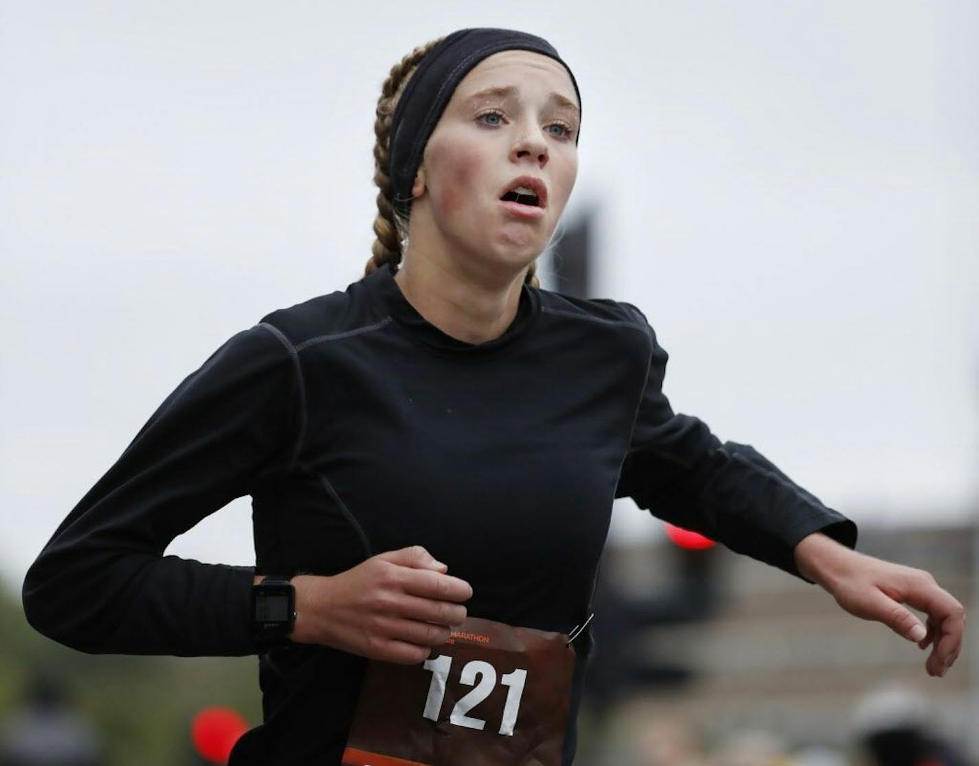 15-year old Tierney Wolfgram of Woodbury, running her first marathon, finished the Twin Cities Marathon in a time of 2:40:03, good for sixth place among women runners.