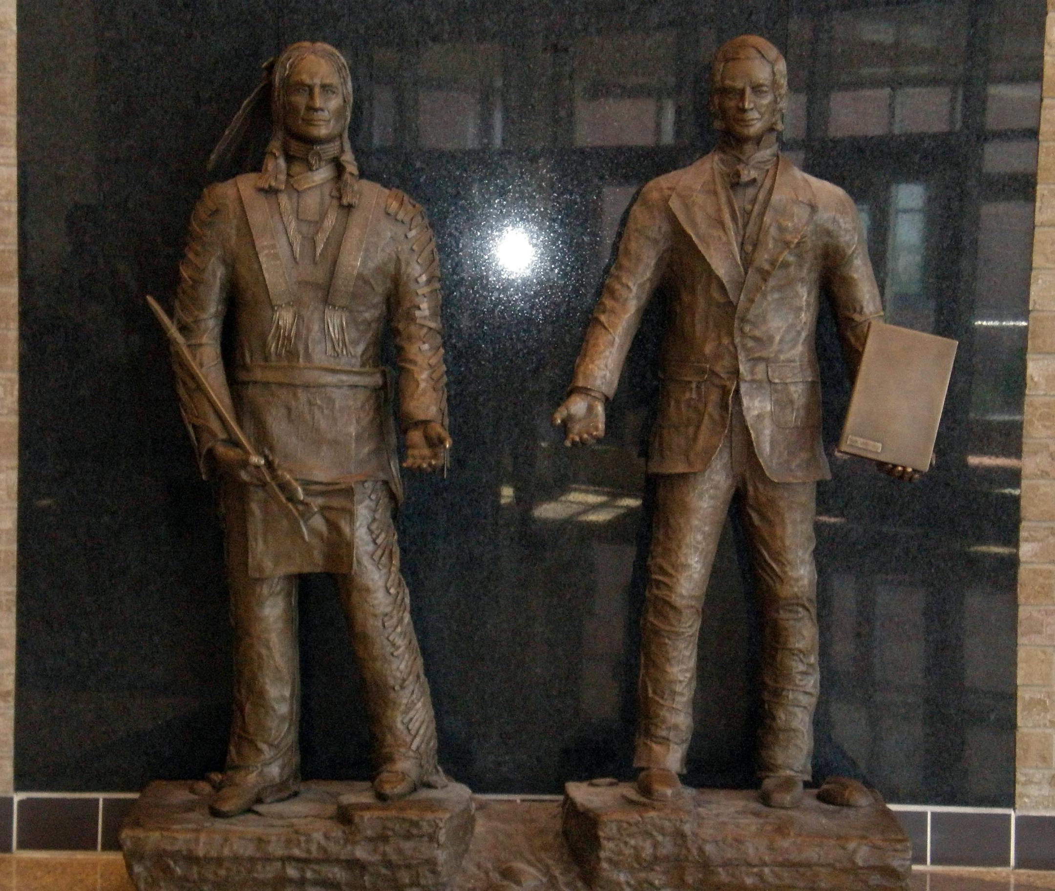 Bronze sculptor Bill Huber, a graduate of Shakopee High School, spent the last two years of his life creating the seven-foot statue of Chief Shakopee and Samuel Pond that was unveiled in the entryway of the new high school building last weekend.