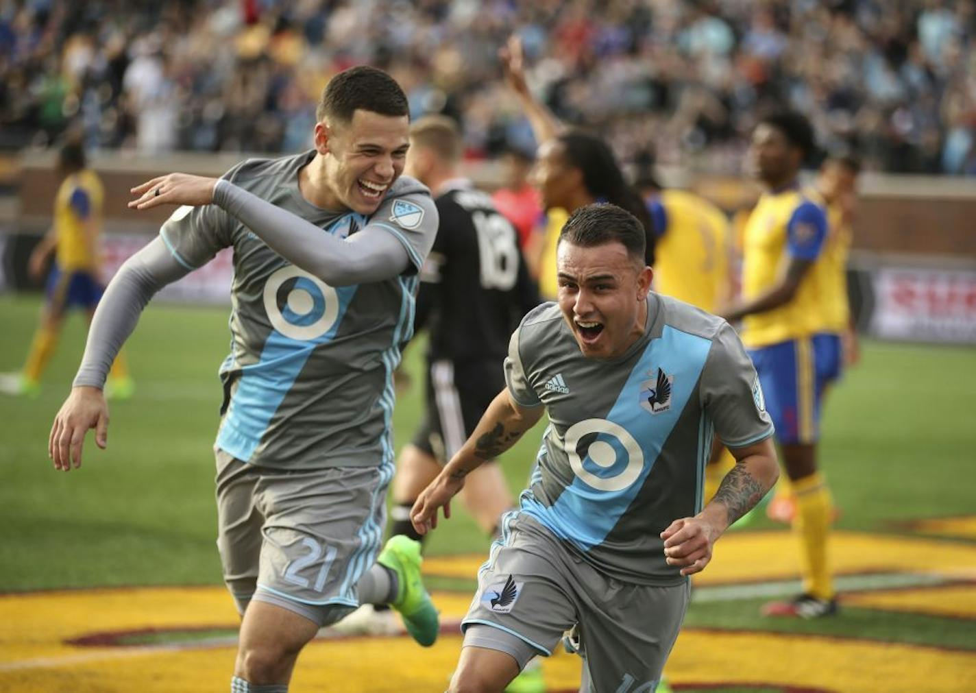 Back when they were teammates: Christian "Superman" Ramirez (left) helped Miguel "Batman" Ibarra celebrate a goal during a Minnesota United game in 2017.