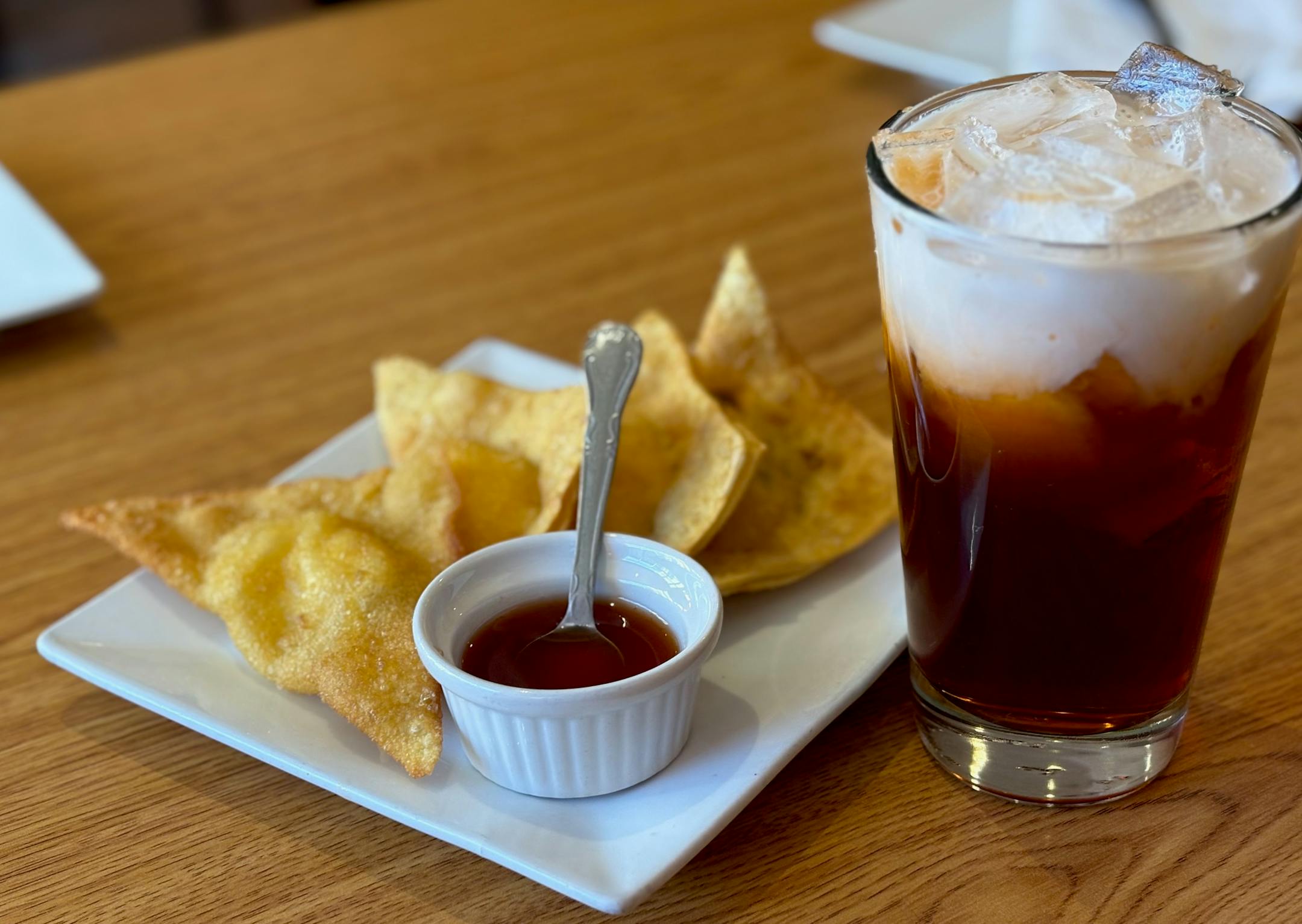 Khun Nai Thai Iced Tea and cream cheese wontons.