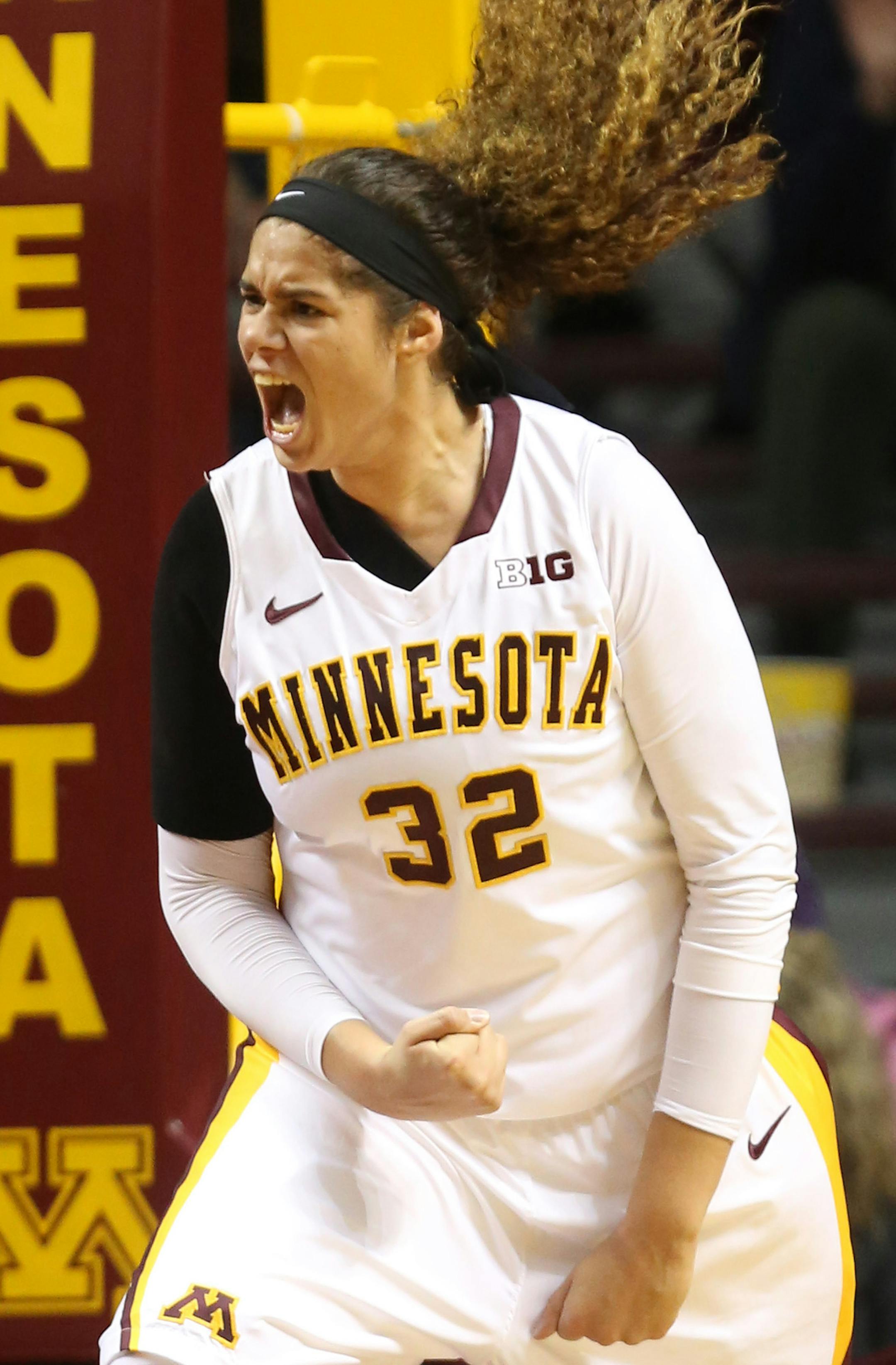 Gophers Amanda Zahui celebrated after scoring on Kansas during the second half at Williams Arena in Minneapolis, Min., Wednesday, November 20, 2013. Gophers won against Kansas 70-59. ] (KYNDELL HARKNESS/STAR TRIBUNE) kyndell.harkness@startribune.com