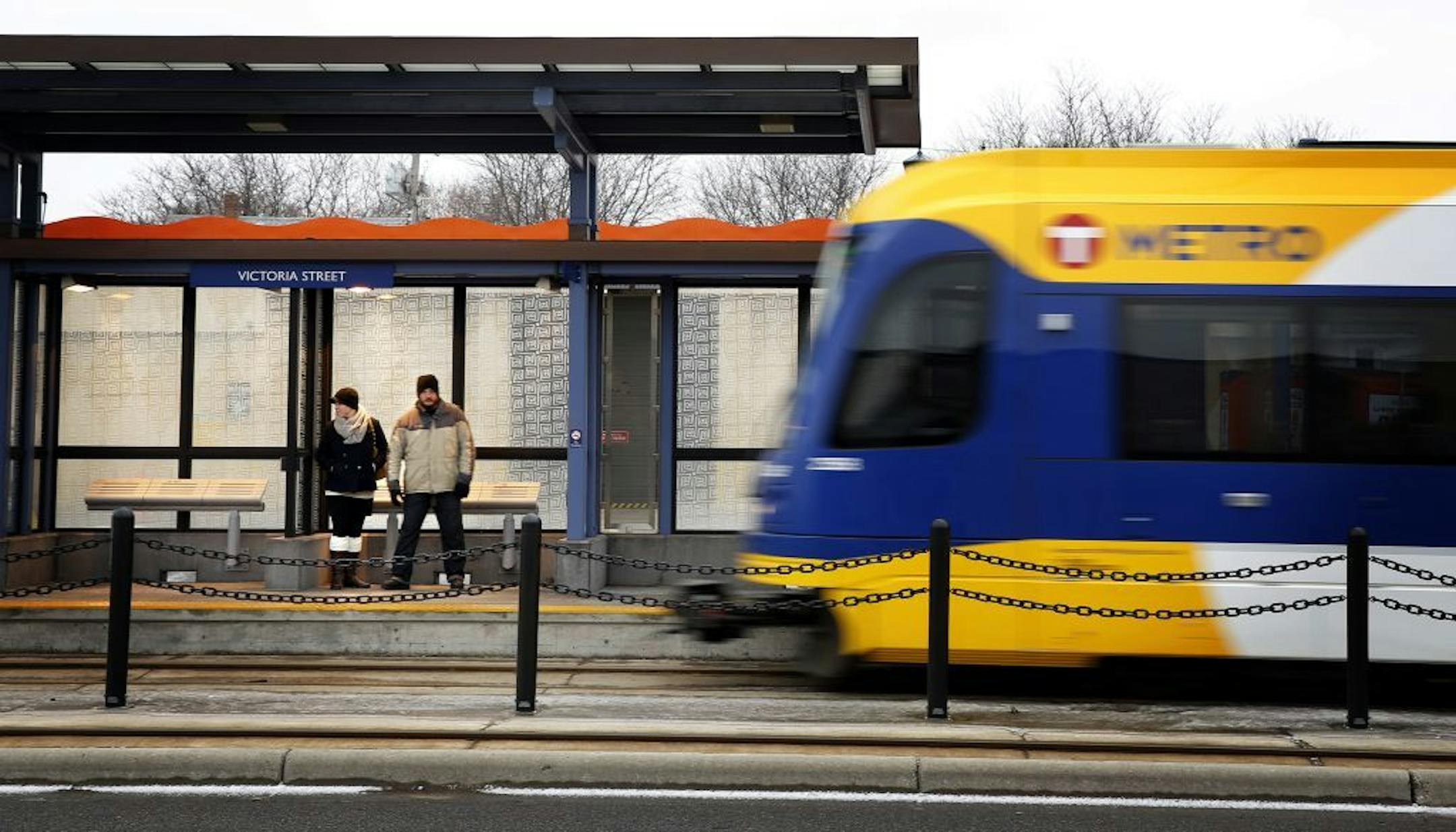Passengers waited for the Green Line at Victoria Street station in 2014. The station is two blocks from Chatsworth Street, where a vehicle lost control and hit the Green Line track area on Friday.