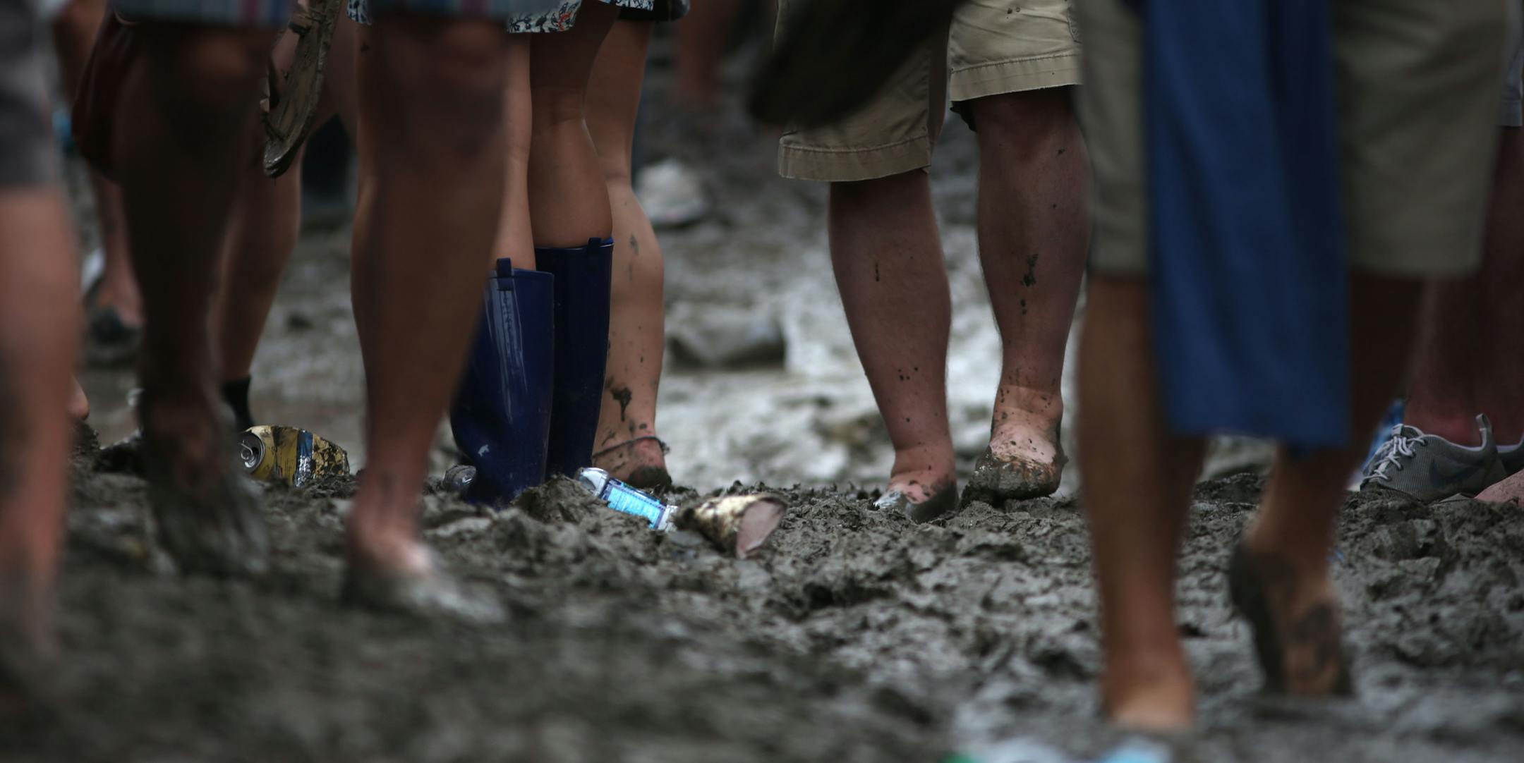 Heavy rains Friday and Saturday left some areas of the festival grounds a sea of mud at New Orleans Jazz and Heritage Festival on Sunday April 26, 2015 in New Orleans. (Kathleen Flynn/NOLA.com The Times-Picayune via AP) MAGS OUT; NO SALES; USA TODAY OUT; THE BATON ROUGE ADVOCATE OUT; THE NEW ORLEANS ADVOCATE OUT