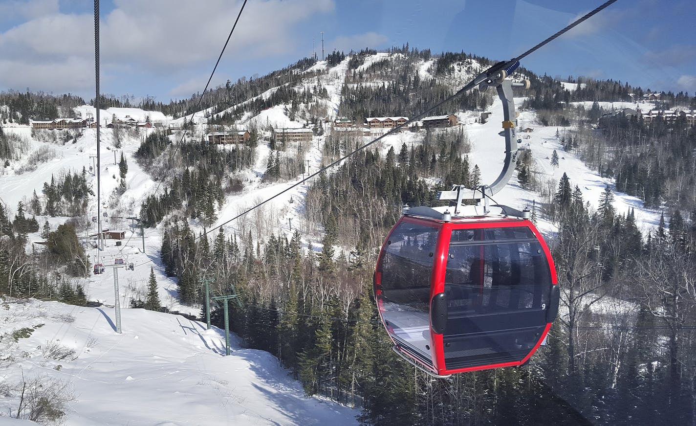 Lutsen Mountains' new eight-passenger gondola system, which debuted in 2015, transports skiers from the main ski village to the top of Moose Mountain, the resort's highest peak.