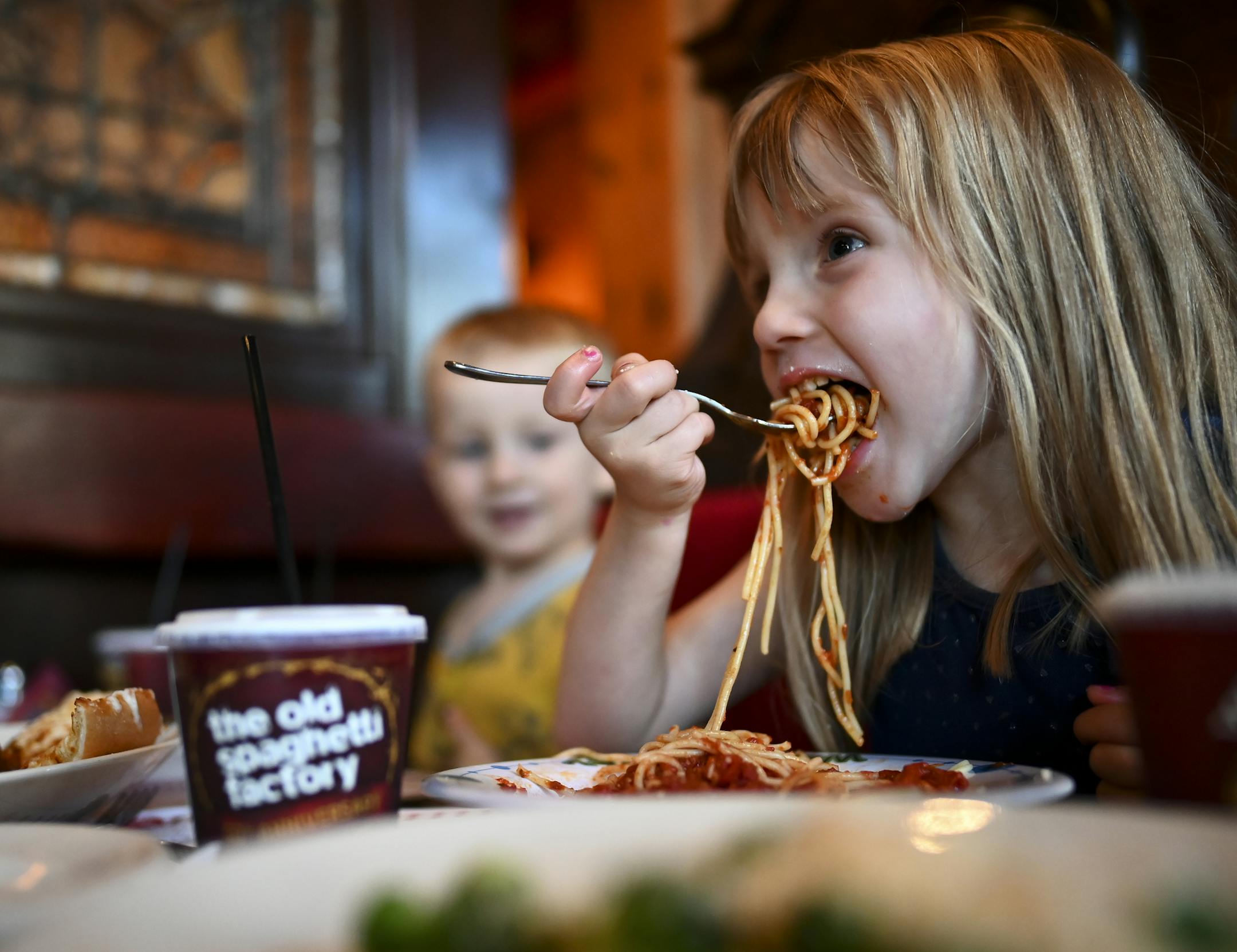 Etta Martin, four, of Minneapolis ate a heaping fork-full of spaghetti while dining with her little brother, Xavier, two, and parents Tuesday night at The Old Spaghetti Factory. "We drive by all the time. She sees it and she wants to go," said Etta's mother, Rebecca, who drives her kids to day care in downtown Minneapolis. ] Aaron Lavinsky • aaron.lavinsky@startribune.com The Spaghetti Factory's closing is a sign of the changing times, more than changing tastes. The cheap eats outlet open