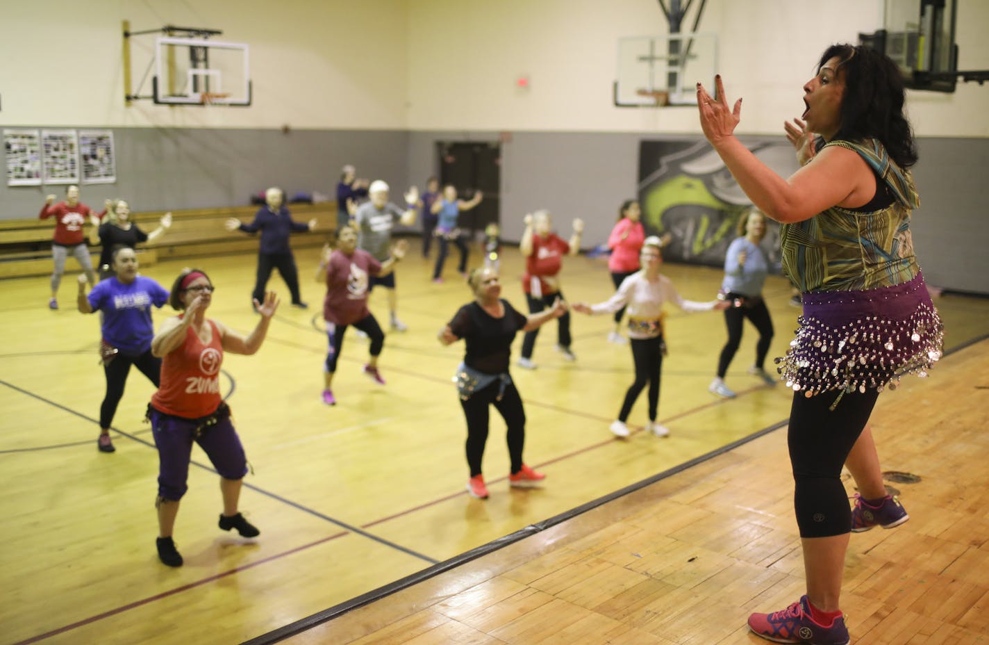 Bernice Arias led her Zumba class in the gym at the Powderhorn Recreation Center on Wednesday, Nov. 9.