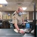 Corrections officer John Wohlwend donned a mask on Tuesday while working his shift at the St. Louis County jail.