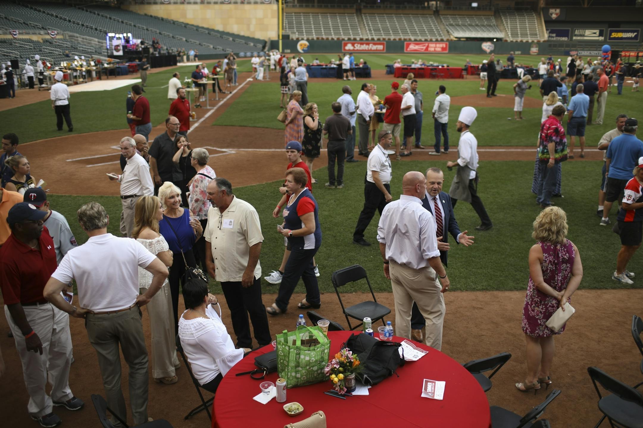 Fans and players visited in the infield during the Twins' 1987 Summer Celebration Thursday night.