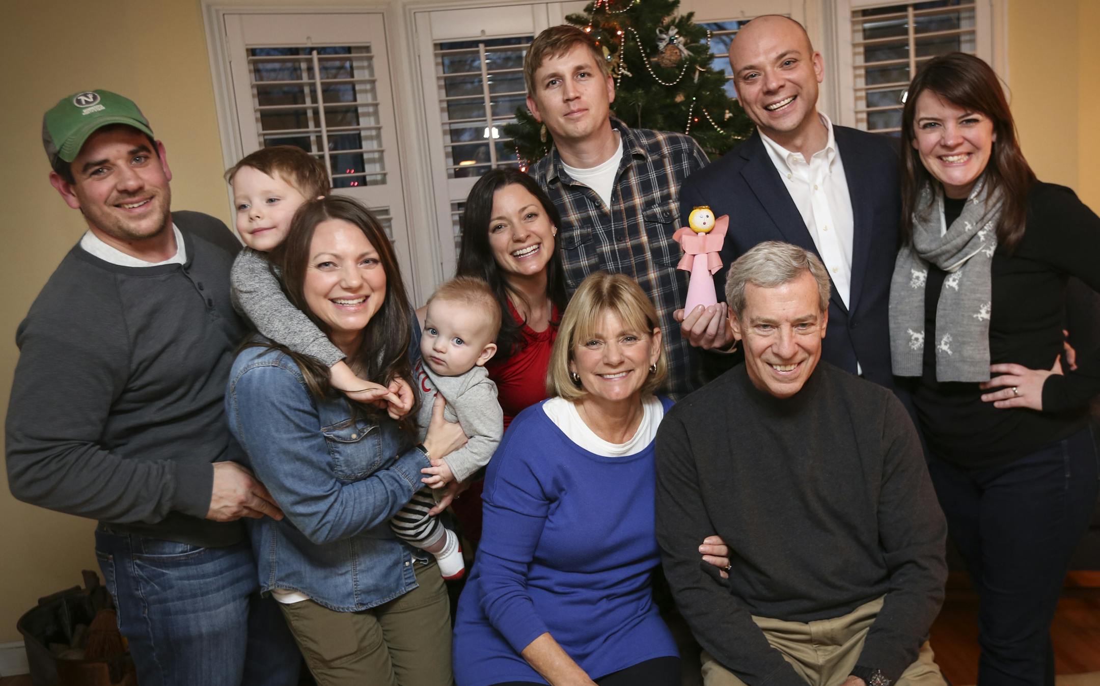 Lynda and Dave Ruce (both in front sitting) posed for a picture with their children and grandchildren, from the left; Bryan Lazorik, Henry Lazorik, Sara Lazorik holding Will Lazorik, Kelly Richey, Chris Richey, Phillip Ruce and Mary Ruce. Photographed in Minneapolis, Minn., on Monday, December 16, 2014. ] REN&#x221a;&#xe2;E JONES SCHNEIDER reneejones@startribune.com
