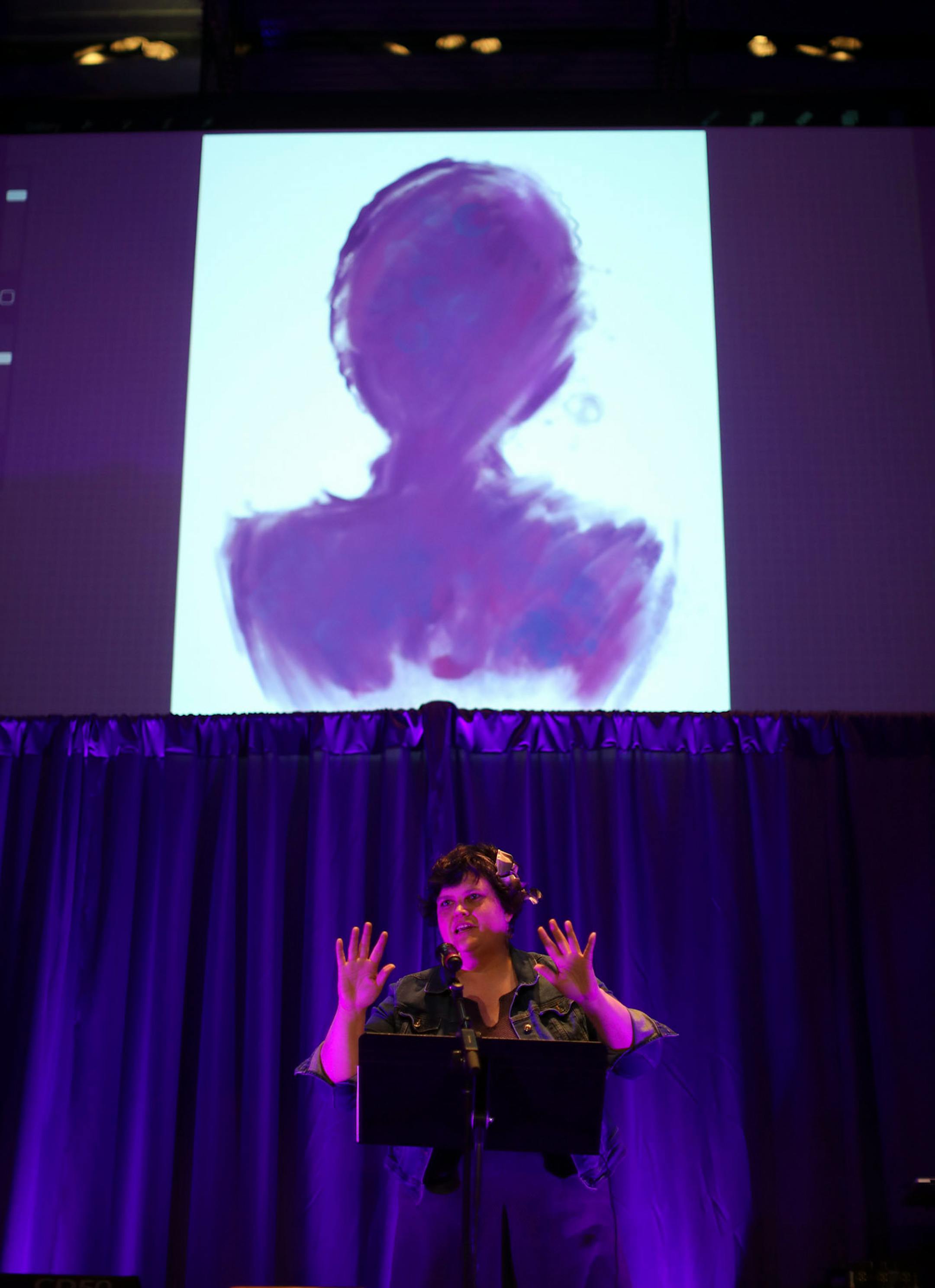 Rebecca Jo Malmstrom, who works in the props department of the Guthrie, recruited the audience to accompany her on the chorus as she sang Prince's "Nothing Compares 2 U." Above her was a projection of an artwork being created in real time to complement the scene.