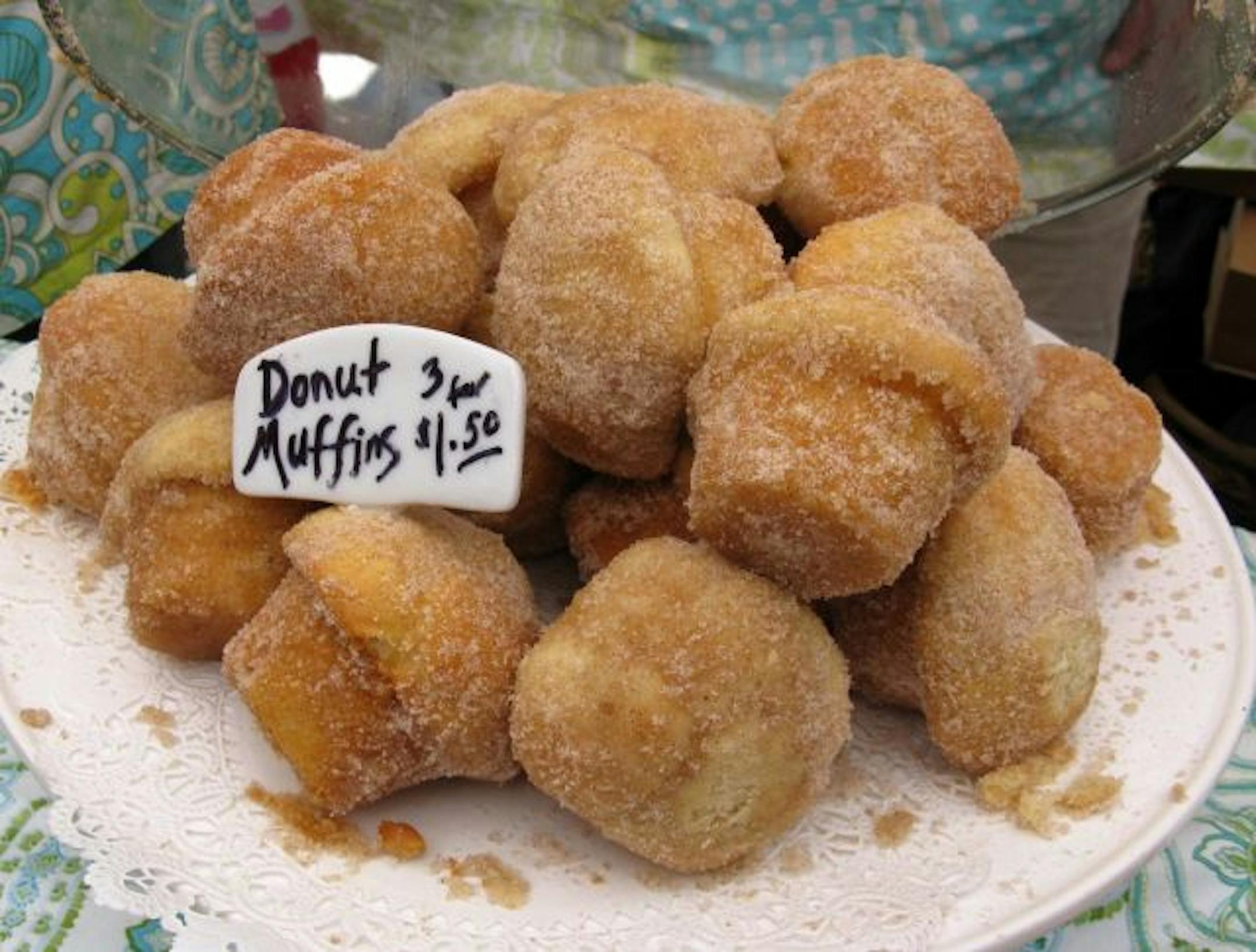 The Party Girls have donut muffins at the Minneapolis Farmers Market.