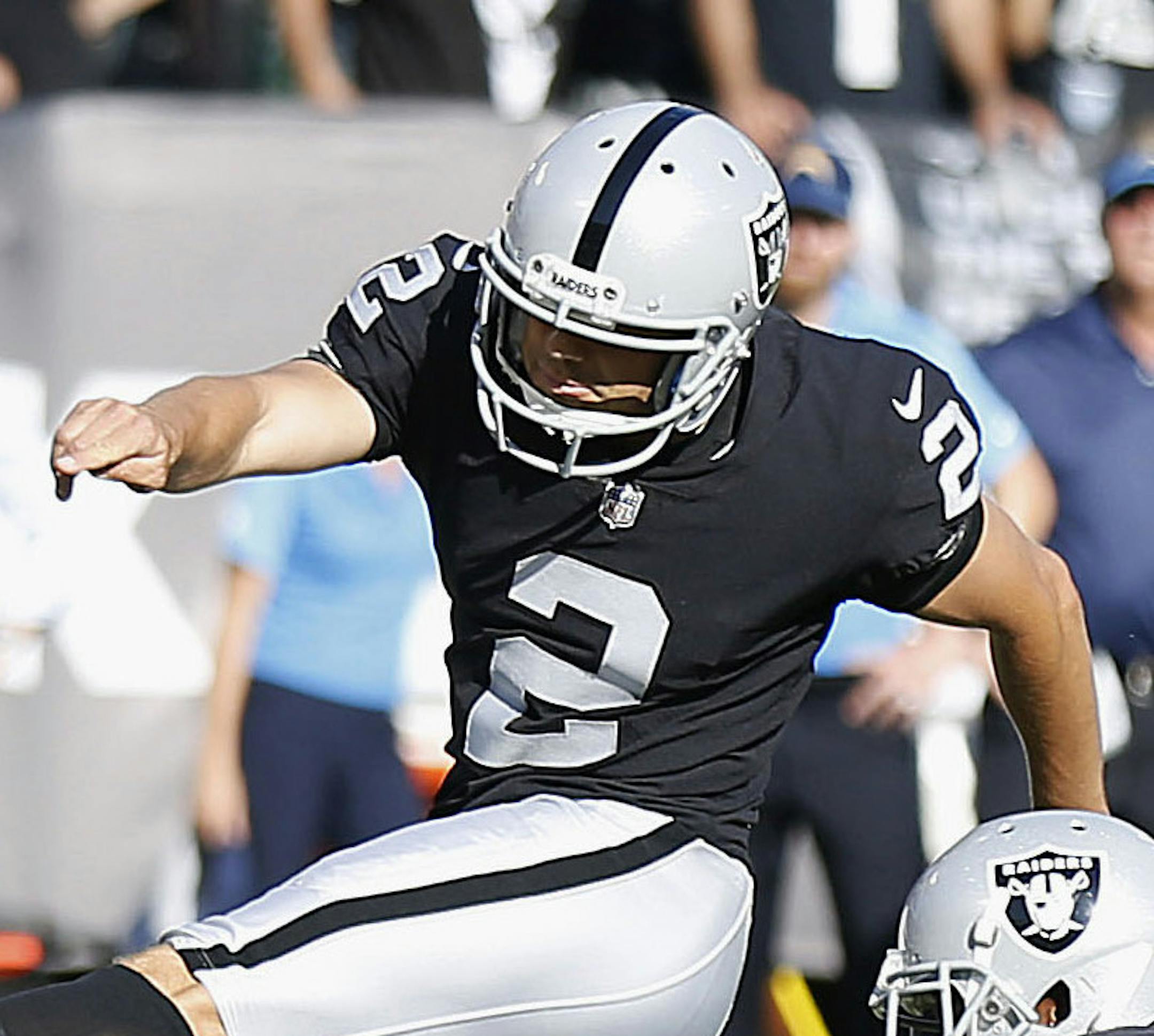 Oakland Raiders kicker Giorgio Tavecchio (2) misses a point after try during the second half of an NFL football game against the Los Angeles Charger in Oakland, Calif., Sunday, Oct. 15, 2017. (AP Photo/D. Ross Cameron)