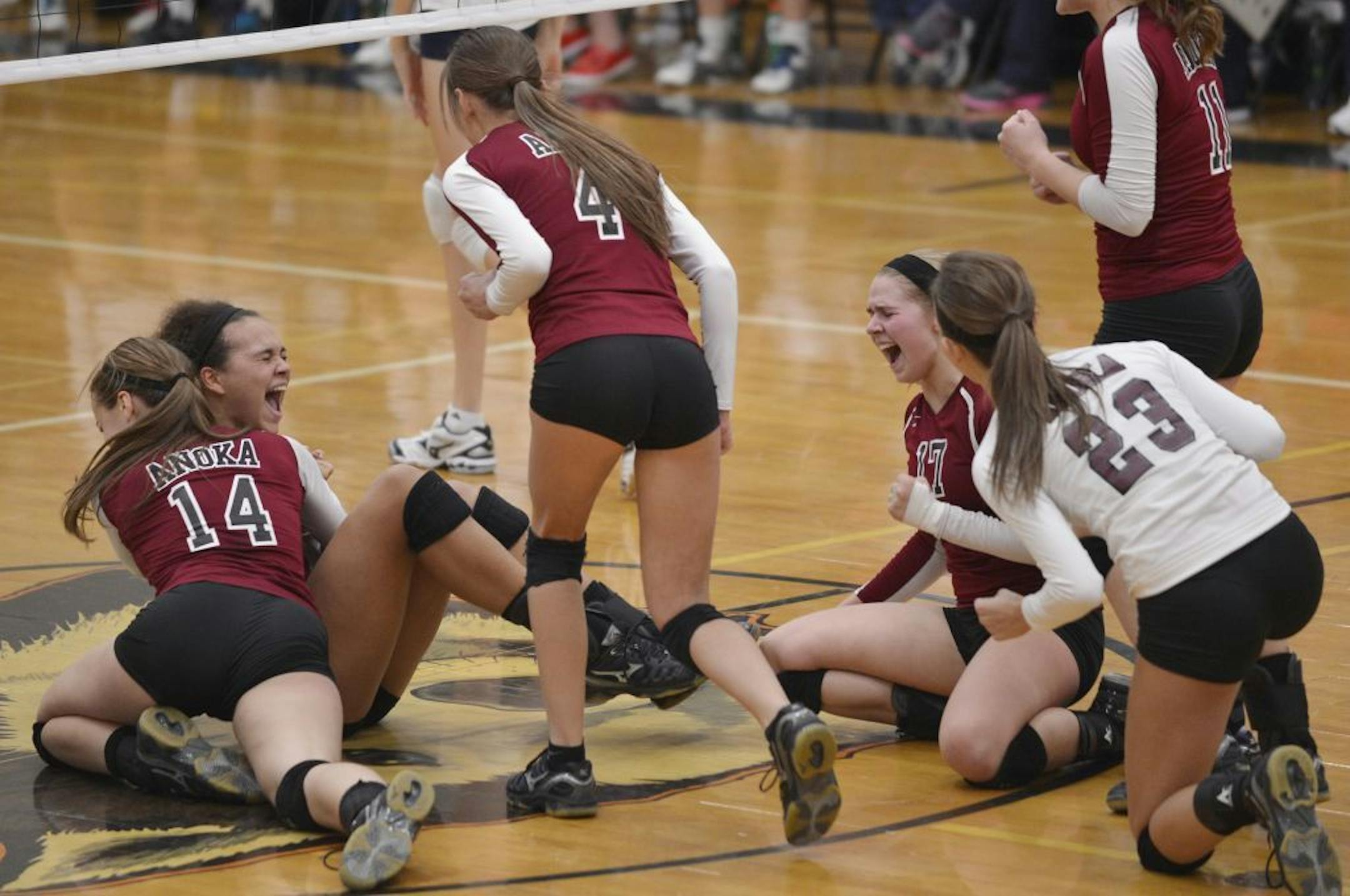 Anoka players celebrate after beating St. Francis
