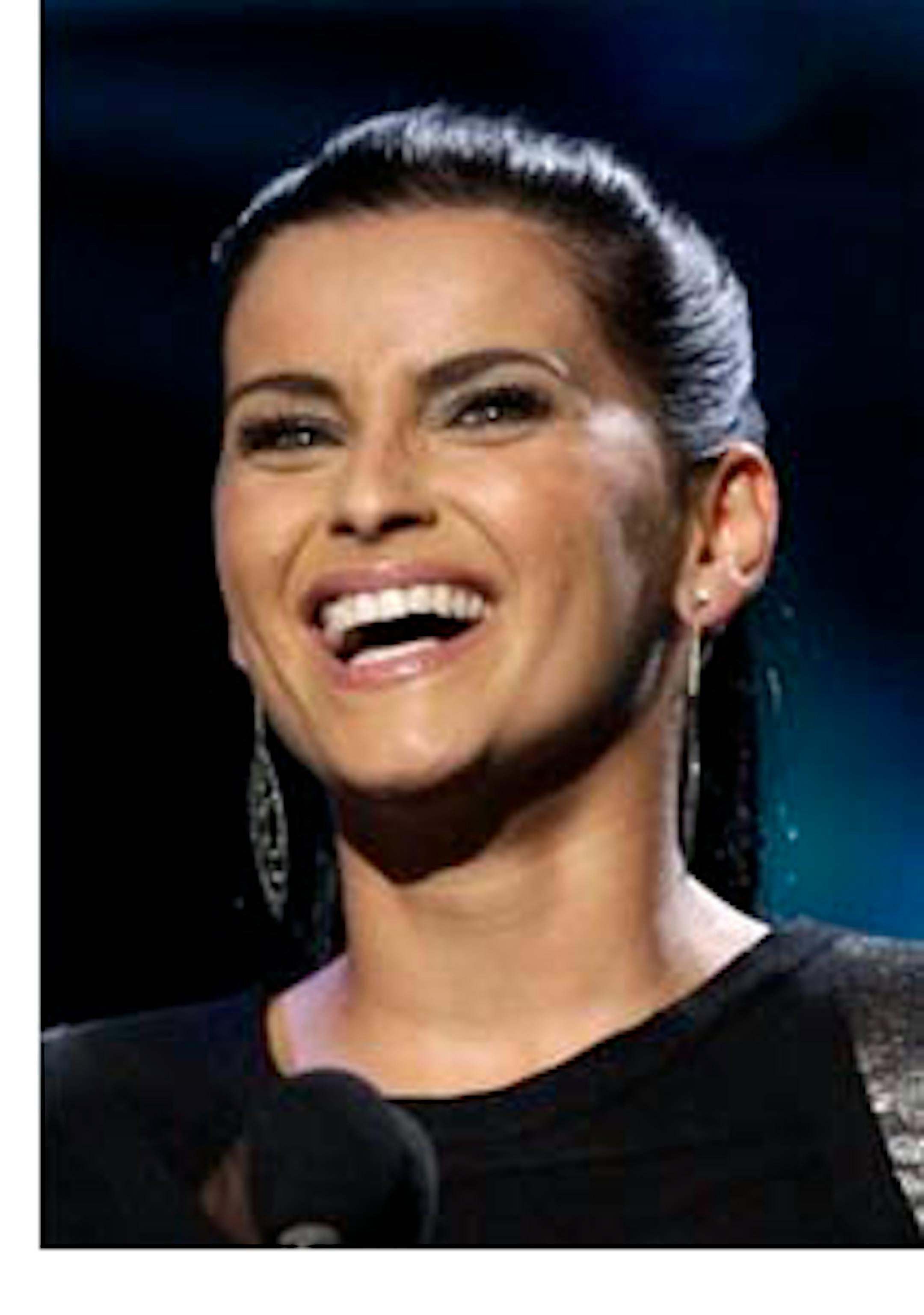 FILE - In this Nov. 11, 2010 file photo, Nelly Furtado accepts the award for best female pop vocal album for "Mi Plan" at the 11th Annual Latin Grammy Awards in Las Vegas. (AP Photo/Julie Jacobson, file)