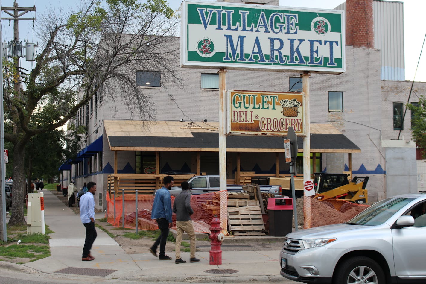 Village Market Mall on 24th Street and 10th Avenue South. The owner has built an unpermitted porch structure, and the city has ordered work there to stop.