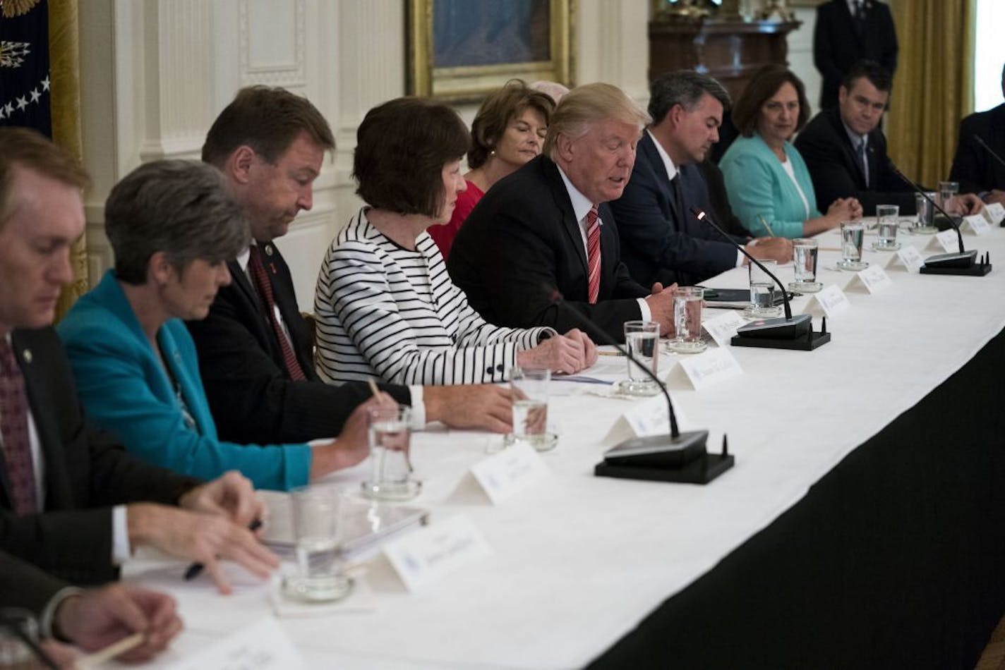 President Donald Trump hosts Republican senators to discuss health care legislation, at the White House in Washington, June 27, 2017. A number of senators who have voiced their concerns were seated closest to the president. From left: Sens. James Lankford (R-Okla.), Joni Ernst (R-Okla.), Dean Heller (R-Nev.), Susan Collins (R-Maine), Lisa Murkowski (R-Alaska), Trump, Cory Gardner (R-Colo.), Deb Fischer (R-Neb.).