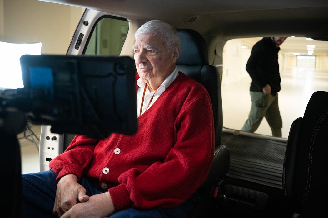 Burt Cohen waited inside a van for Edwards Safe Passage co-founder Michael Lynds in Edina on Jan. 18.