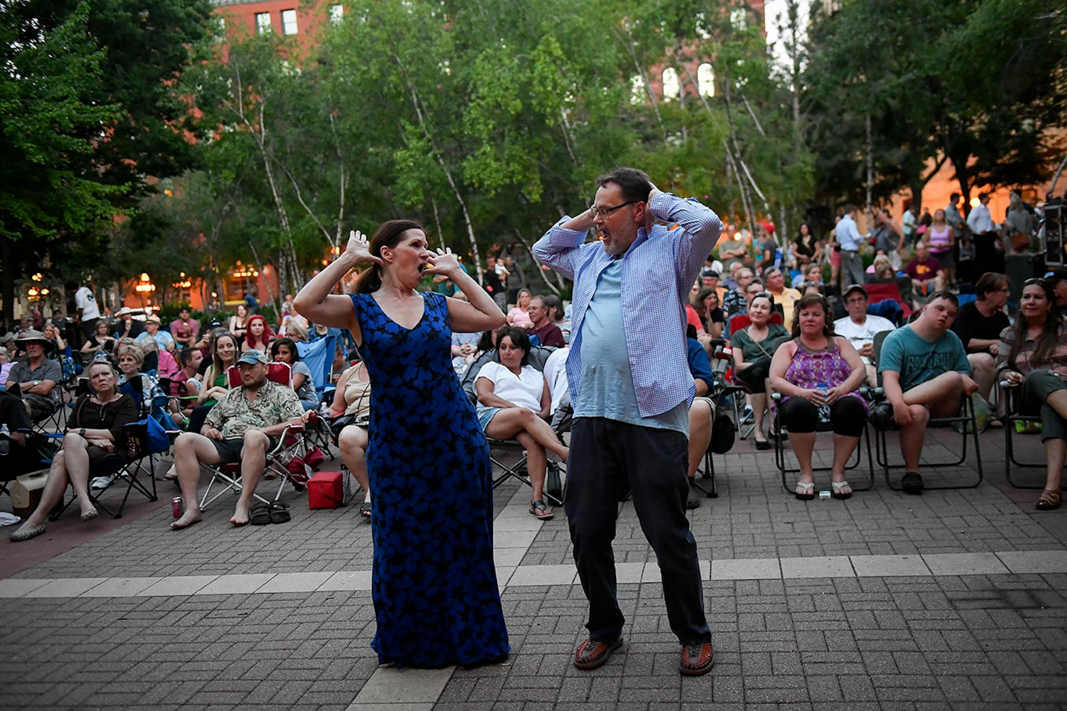 Lisa Egnash and Dale Swenson, both from St. Paul, danced as the band "3 Minute Hero" performed Thursday night.