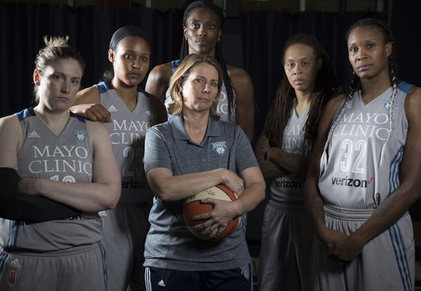 Lynx starters left to right Lindsay Whalen, Maya Moore, Sylvia Fowles, Seimone Augustus, and Rebekkah Brunson with head coach Cheryl Reeve at Mayo Cli