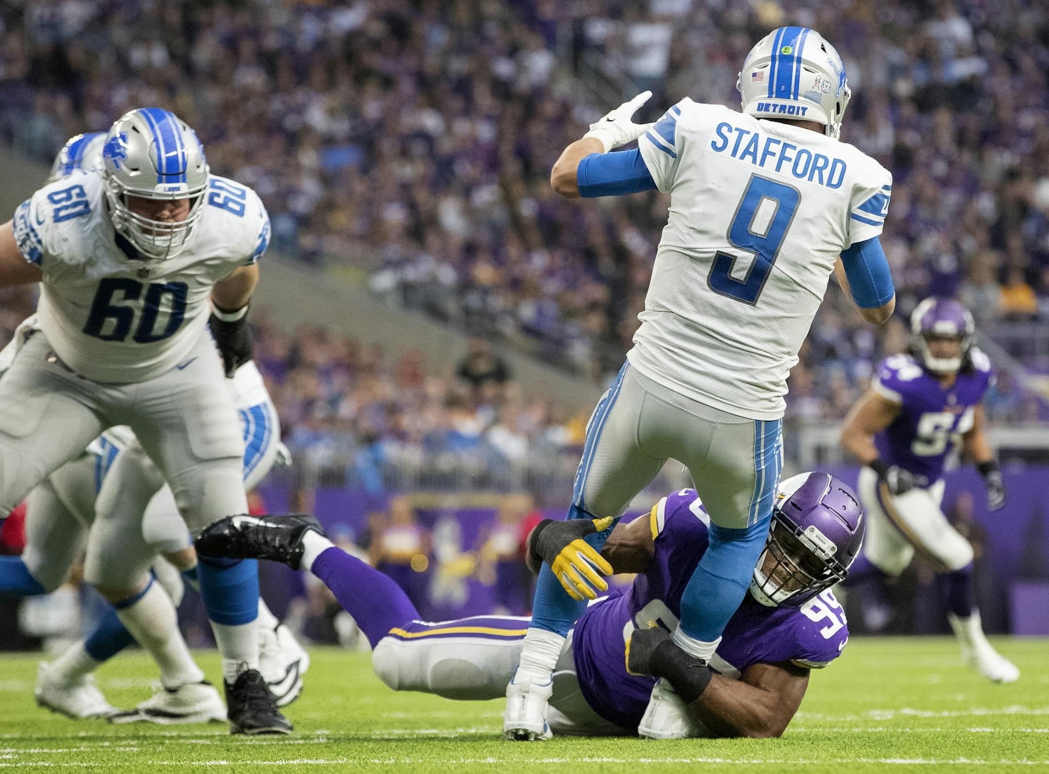 Danielle Hunter sacked Matthew Stafford in the third quarter.