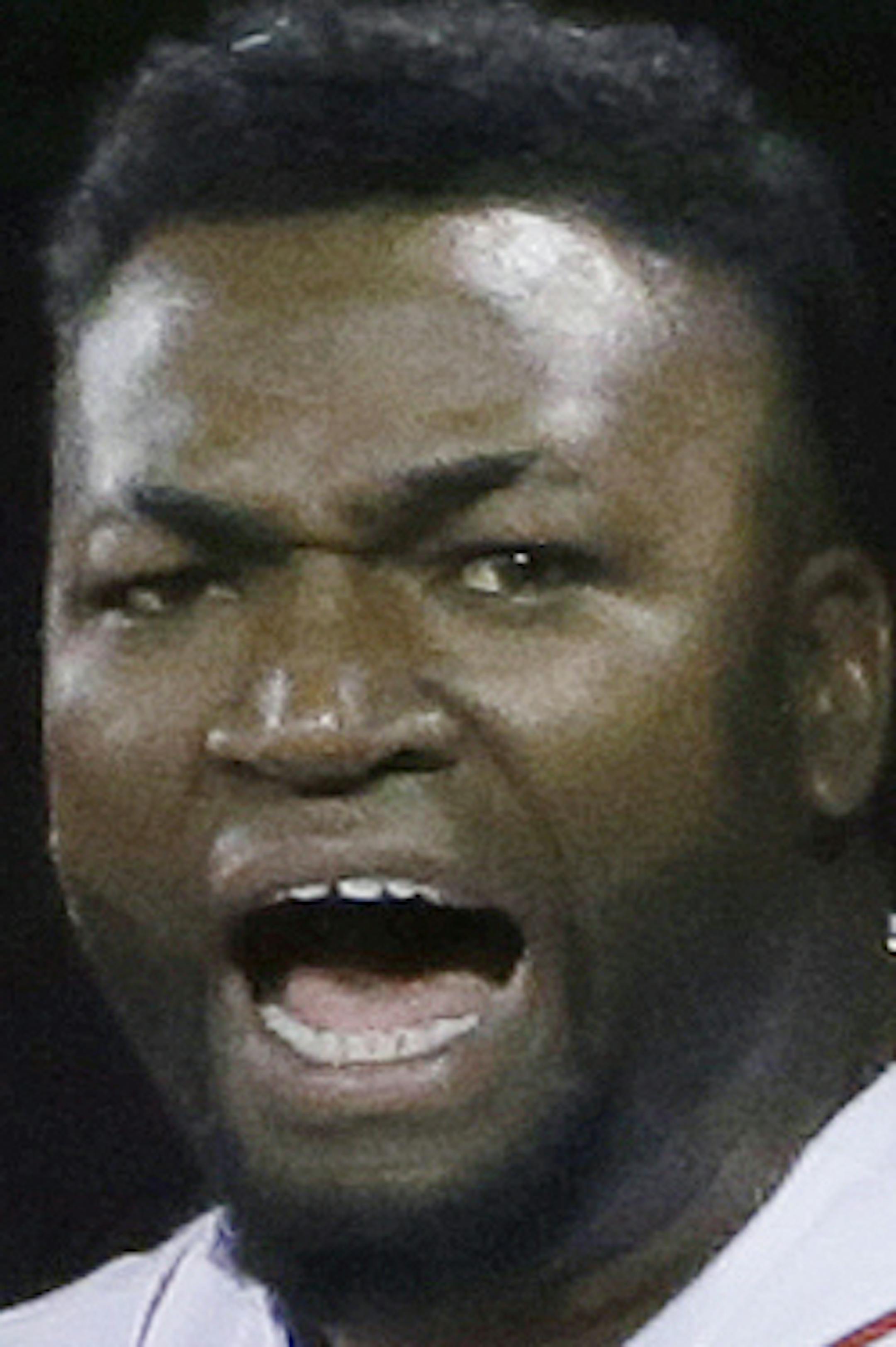 FILE - In this Oct. 10, 2016, file photo, Boston Red Sox designated hitter David Ortiz encourages the crowd from the dugout during the eighth inning in Game 3 of baseball's American League Division Series against the Cleveland Indians in Boston. Former Boston Red Sox slugger Ortiz was shot and wounded in his native Dominican Republic, his father told ESPN on Sunday, June 9, 2019. (AP Photo/Elise Amendola, File)
