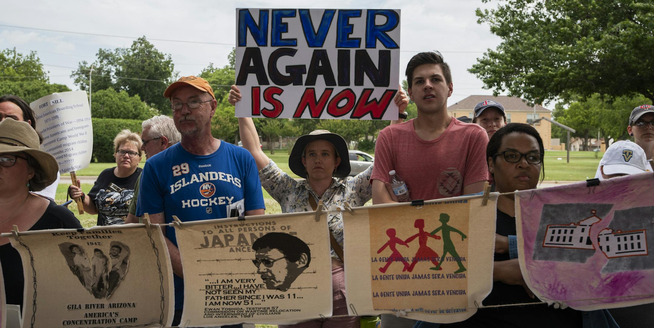 Demonstrators protest plans to house migrant children at Fort Sill, in Lawton, Okla., June 22, 2019. Protesters called the plan for the site, home to an internment camp for Japanese-Americans during World War II, a return to one of the nation’s great shames. (Nick Oxford/The New York Times)