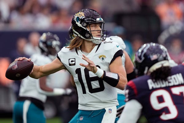Quarterback Trevor Lawrence is trying to complete a worst-to-first run in the AFC South with the Jaguars. 
