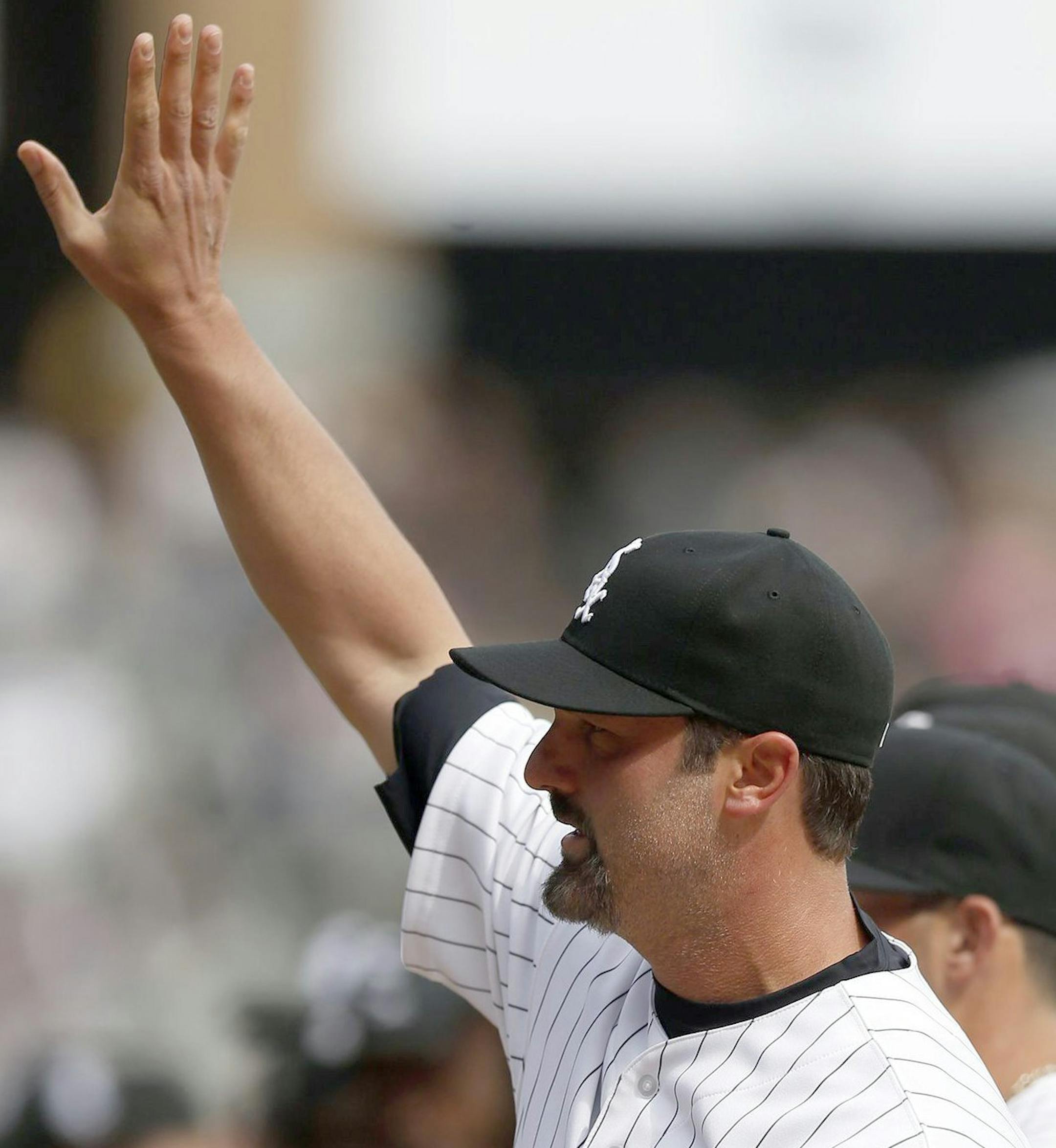 Chicago White Sox's Paul Konerko is introduced before the game against the Minnesota Twins. The Chicago White Sox defeated the Minnesota Twins, 5-3, on Opening Day at U.S. Cellular Field in Chicago on Monday, March 31, 2014. (Scott Strazzante/Chicago Tribune/MCT)
