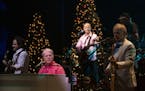 Brian Wilson looked towards his longtime Beach Boy bandmate Al Jardine on guitar early in their Christmas show Wednesday night at the Orpheum.