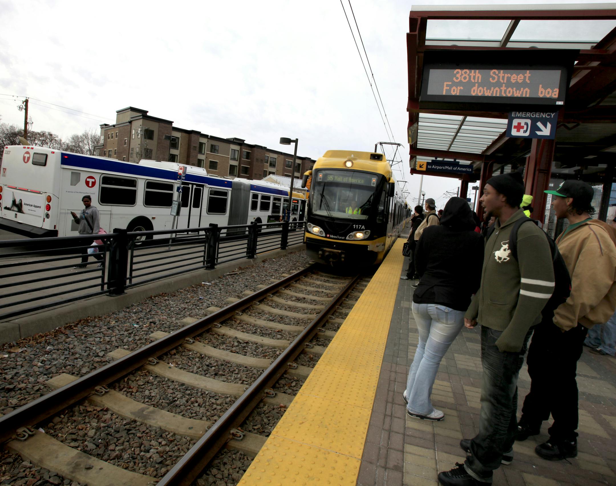 At 38th and Hiawatha Avenue South, passengers took the bus (on left) to downtown Minneapolis after transferring from the light-rail from the Mall of America. Light-rail service suspended and road closed after cable problem on the Sabo bridge. The Sabo bridge was closed at 26th and Hiawatha Avenue South in Minneapolis, MN on Monday February 20, 2012. ] JOEL KOYAMA‚Ä¢joel.koyama@startribune.com Light-rail service suspended, bridge, road closed after cable problem. The failure of a