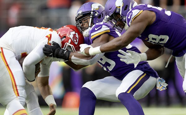Vikings edge rusher Danielle Hunter, center, had five sacks in October, including one of Chiefs quarterback Patrick Mahomes. 