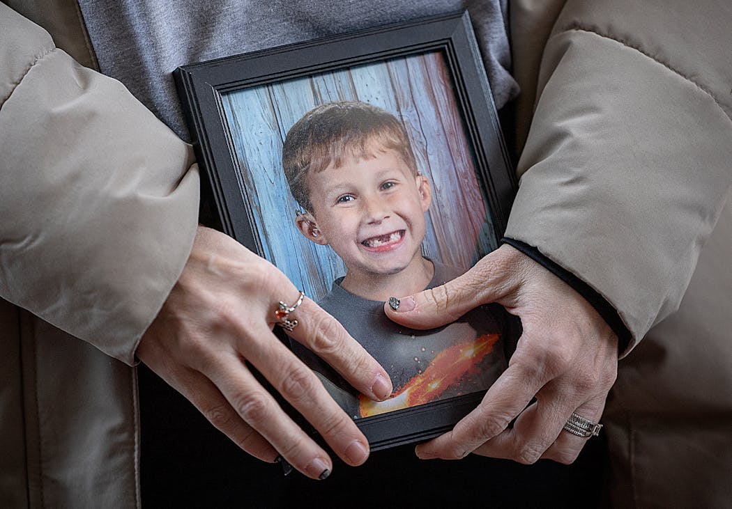 Eli Hart’s stepmother, Josephine Josephson, held onto a photo of him after leaving the courtroom.